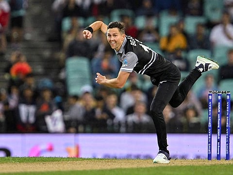 New Zealand’s Trent Boult bowls during the ICC men’s Twenty20 World Cup 2022 cricket match against Australia at the Sydney Cricket Ground (SCG) on October 22, 2022. 