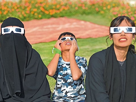 Residents gather to witness Partial Solar Eclipse at the Al Thuraya Astronomy Centre in Dubai.