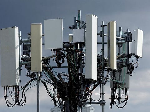 A cell phone tower is shown near John Wayne Airport in Santa Ana, California U.S. January 18, 2022. Concerns that the 5G service could interfere with airplane altimeters, which give data on a plane's height above the ground and are crucial for bad-weather landing, led to disruptions at some U.S. airports earlier this year.