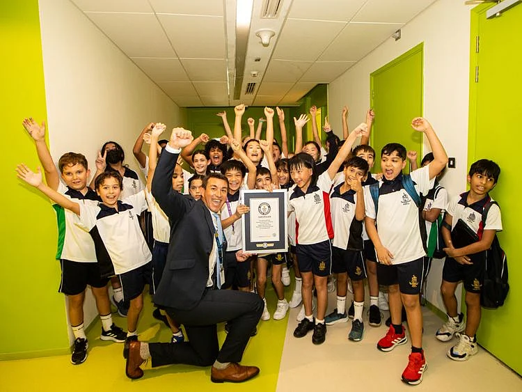Steven Lupton_PrincipalRAD with students_2-1666763062961