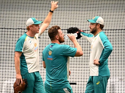 Australia's captain Aaron Finch (centre), who is under fire for his knock against Sri Lanka, talks to coach Andrew McDonald (left) and assistant coach Daniel Vettori in the nets in Melbourne on Thursday.