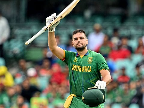 South Africa’s Rilee Rossouw celebrates reaching a century during the ICC Men’s Twenty20 World Cup 2022 cricket match against Bangladesh at the Sydney Cricket Ground on October 27, 2022. The win over Bangladesh put South Africa back on course for a place in the semifinals.