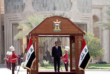 Prime Minister Mohammad Shia Al Sudani arriving for the official handover ceremony at the Republican Palace, the government's seat, in Baghdad's green zone.  