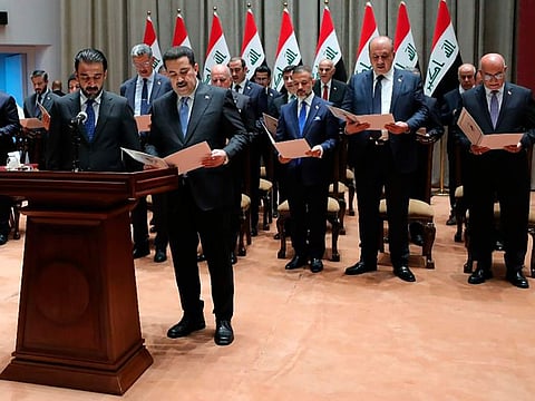 Iraqi prime minister and other ministers of the new Iraqi government are sworn in during the parliamentary session in Baghdad, on October 27, 2022.