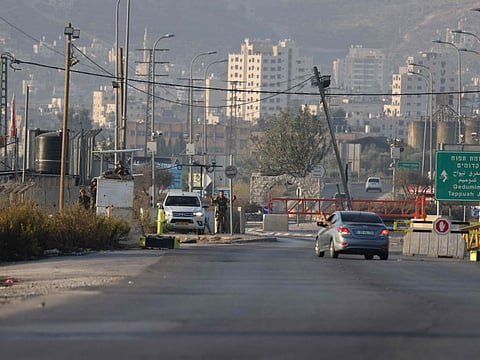 A picture taken early October 28, 2022 shows the Israeli checkpoint of Huwara, south of Nablus in West Bank.  