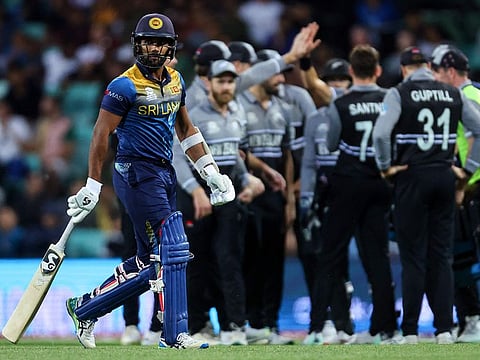 Sri Lanka's Chamika Karunaratne leaves the field after being dismissed during the ICC men's Twenty20 World Cup 2022 cricket match between New Zealand and Sri Lanka at the Sydney Cricket Ground in Sydney. New Zealand won by 65 runs.