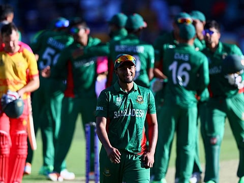 Bangladesh captain Shakib Al Hasan (centre) celebrates with teammates after winning the Twenty20 World Cup 2022 match against Zimbabwe at The Gabba on Sunday.