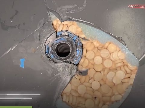 Pills stuffed in machinery.