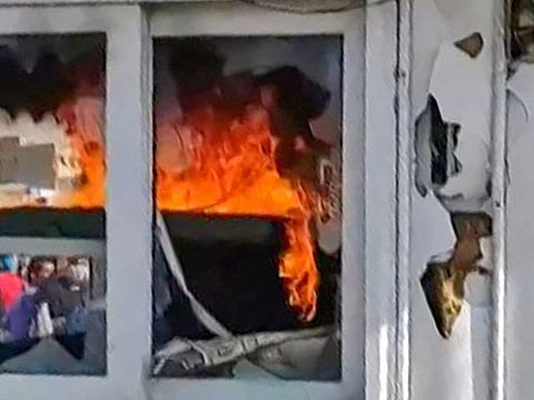  This image grab from a UGC video posted on November 3, 2022, reportedly shows a burning police kiosk torched by protesters in Iran's northern Karaj county, northwest of the capital, seemingly after a 40th day mourning ceremony held for a slain protester.  