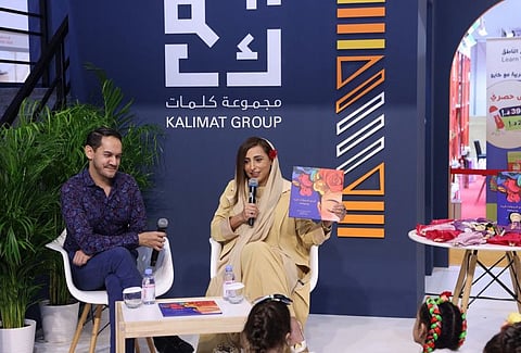 Bodour Al Qasimi (R), founder and CEO of Kalimat Group, led a story-telling session in Arabic about Frida Kahlo at SIBF 2022