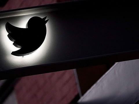 The Twitter logo is seen on the awning of the building that houses the Twitter office in New York, Wednesday, Oct. 26, 2022. Employees were bracing for widespread layoffs at Twitter Friday, Nov. 4,  as new owner Elon Musk overhauls the social platform. 