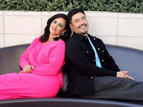 Melissa Fumero, left, and Randall Park, cast members in the Netflix series "Blockbuster," pose together for a portrait, Monday, Oct. 24, 2022.