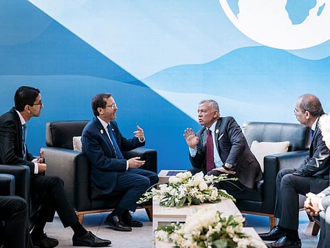 Jordan's King Abdullah II meets with Israel's President Isaac Herzog, at the COP27 climate summit in Sharm Al Sheikh.