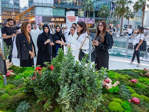 Sheikha Latifa bint Mohammed bin Rashid Al Maktoum (second from left) during her tour of the event at d3