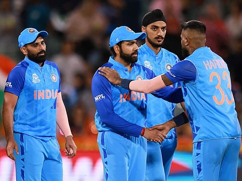 Disappointed: India’s captain Rohit Sharma shakes hands with teammate Hardik Pandya, following the T20 World Cup cricket semifinal loss to England in Adelaide, Australia, on November 10, 2022. England defeated India by ten wickets. 
