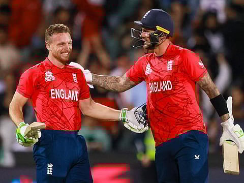 England’s skipper Jos Buttler (left) and Alex Hales celebrate after the T20 World Cup cricket semifinal win against India in Adelaide, Australia, on November 10, 2022. England defeated India by ten wickets. 