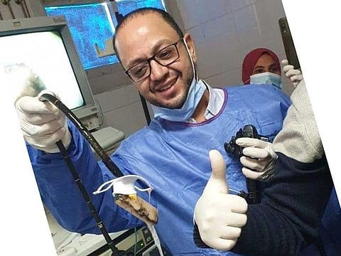 The phone extracted from inamtes stomach.