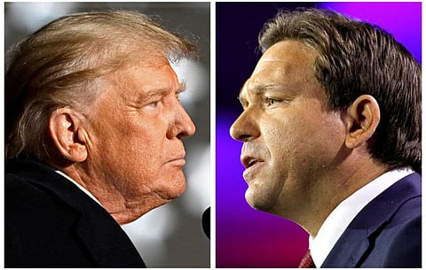 Trump and Florida Governor Ron DeSantis speak at midterm election rallies, in Dayton, Ohio, on November 7, 2022 and Tampa, Florida, on November 8, 2022 in a combination of photos. 