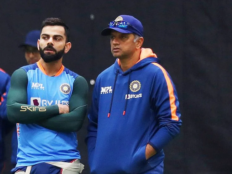 India's Virat Kohli interacts with head coach Rahul Dravid during a practice session ahead of the match against Bangladesh at ICC Men's T20 World Cup 2022, at Adelaide Oval
