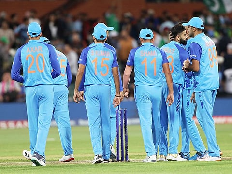 Indian players walk back to the pavilion after the Semi-Final match of T20 World Cup, at Adelaide Oval, in Adelaide on Thursday. 