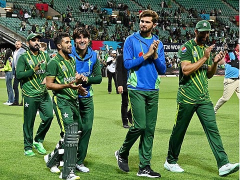 Pakistans cricketers celebrate after victory in the T20 World Cup 2022 semi-final match against New Zealand at the Sydney Cricket Ground in Sydney on November 9, 2022. 