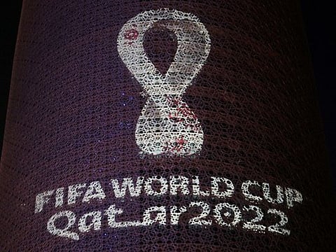 The tournament's official logo for the 2022 Qatar World Cup is seen on the Doha Tower, in Doha. 