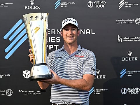 Winner of the Asian Tour's International Series - Egypt, Andy Ogletree with his trophy