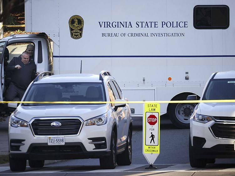 A Virginia State Police criminal investigation truck is shown at the crime scene where 3 people were killed and 2 others wounded on the grounds of the University of Virginia on November 14, 2022 in Charlottesville, Virginia.