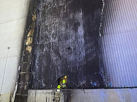The Dubai Civil Defence team in action at the fire location. 