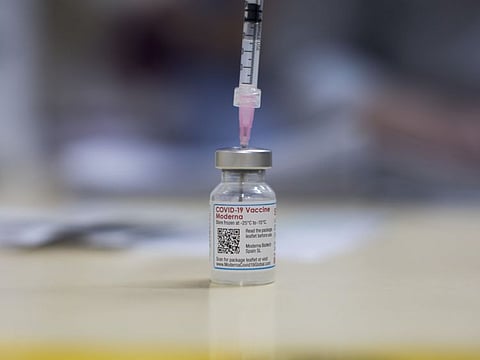 A vial of the Moderna COVID-19 vaccine at a pharmacy in Sydney, Australia.