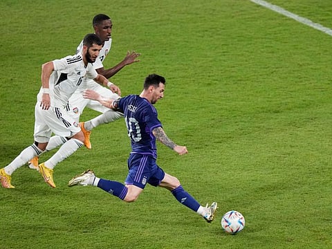 Argentina's Lionel Messi scores during the friendly against UAE in Abu Dhabi on Wednesday.