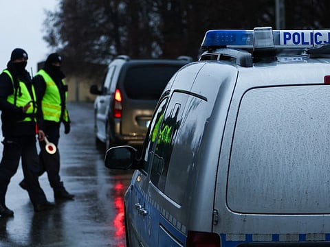 Police officers at a blockade after an explosion in Przewodow, a village in eastern Poland near the border with Ukraine, on November 16, 2022.  