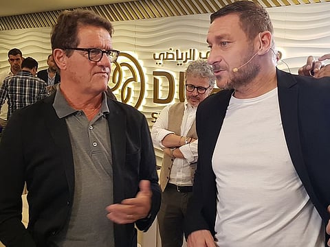 Former England boss Fabio Capello (left) with former Italy striker Francesco Totti at the Dubai Sports Council headquarters, Dubai, UAE.