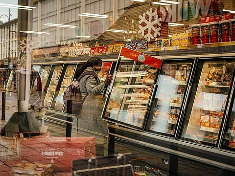 A customer browses the freezer section at a supermarket in Crawley, UK. UK inflation rose more than expected to a 41-year high of 11.1%, adding to pressure on the Bank of England to raise interest rates again. 