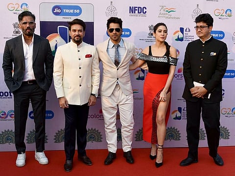 Union Minister for Information and Broadcasting Anurag Singh Thakur, Bollywood actors Suniel Shetty, Varun Dhawan, Sara Ali Khan with Writer and CBFC Chairperson Prasoon Joshi on the red carpet of the inaugural ceremony of 53rd International Film Festival of India (IFFI), on Sunday