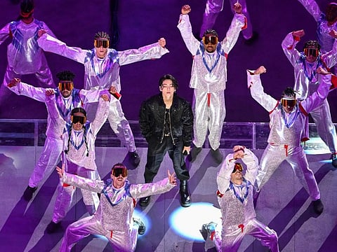 South Korean singer Jungkook performs during the opening ceremony.