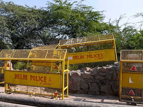Forest area of Mehrauli is barricaded where Aftab Poonawalla, an accused in the Shraddha Walker murder case, claims to have disposed the body parts of the victim, in New Delhi on Tuesday, Nov 22, 2022.  