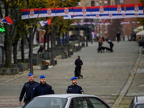 Members of the European Union police patrol in the north of Mitrovica on November 22, 2022. The failure on November 22, 2022 of EU-mediated talks between Serbia and Kosovo on resolving a car licence plates row threatens to trigger one of the worst regional crises in years.  