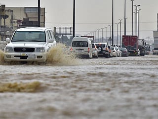 
Photos: Saudi storm sweep away cars, cuts road to Mecca
