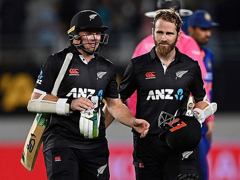 New Zealand's Tom Latham, left, and Kane Williamson walk off after their win over India in their One Day International match in Auckland, New Zealand, Friday, November 25, 2022.  