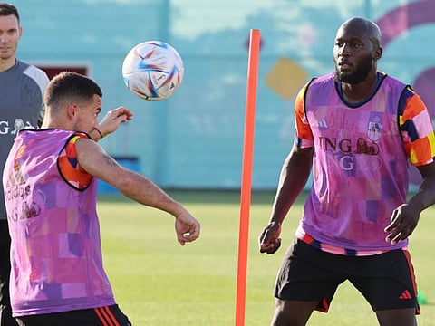 Belgium's Romelu Lukaku (right) and Eden Hazard take part in a training session at Salwa Training site, southwest of Doha.