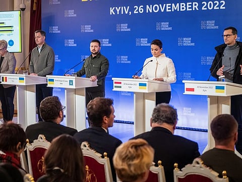 From left: Lithuanian Prime Minister Ingrida Simonyte, Belgium's Prime Minister Alexander De Croo, Ukraine's President Volodymyr Zelenskiy, Hungarian President Katalin Novak and Polish Prime Minister Mateusz Morawiecki attend a joint news conference after an international summit on grain exports in Kyiv, on November 26, 2022. 