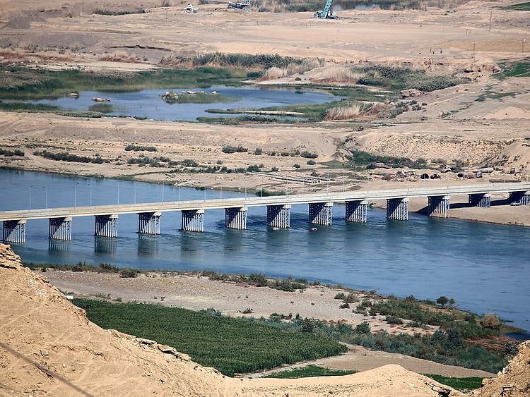 A bridge spans the Tigris river near the Makhoul dam site, in northern Iraq's Salaheddine .province. 