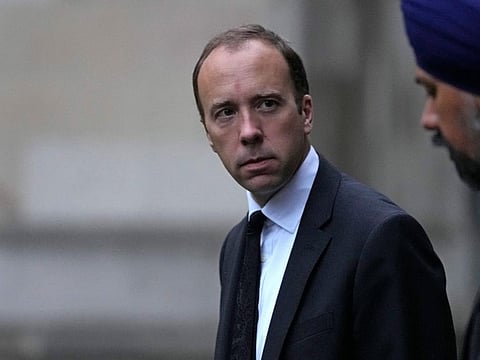 Former Minister for Health Matt Hancock arrives with MP's and Peers for a service of remembrance for British MP David Amess at St Margaret's Church in Westminster in London, Oct. 18, 2021.