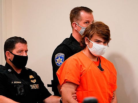 Payton Gendron is led into the courtroom for a hearing at Erie County Court in Buffalo, N.Y., on May 19, 2022. 