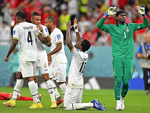 Ghana's players react after the Qatar 2022 World Cup Group H football match against South Korea at the Education City Stadium in Al-Rayyan, west of Doha. Ghana won 3-2.