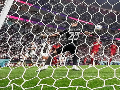 Germany's Niclas Fuellkrug scores his side's opening goal during the World Cup group E match against Spain, at the Al Bayt Stadium in Al Khor, Qatar, on Sunday, November 27, 2022. 