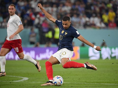 France’s Kylian Mbappe in action against Denmark during the World Cup Group D football match at the Stadium 974 in Doha, Qatar, on November 26, 2022. His two goals in the game tied him with Pele’s record for most World Cup goals (7) before turning 24. 