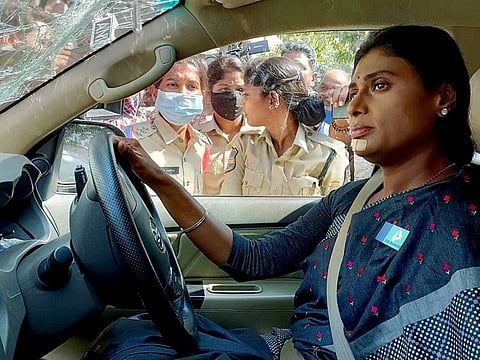 YSR Telangana Party chief Sharmila Reddy sits inside her car as it is being dragged away with the help of a crane while she protests against State Chief Minister K Chandrashekhar Rao, in Hyderabad on Tuesday, November 29, 2022.