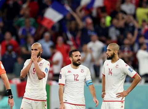 Tunisia's players react at the full time whistle after their match against France at the FIFA World Cup Qatar 2022 at Education City Stadium, Al Rayyan, Qatar. Tunisia won 1-0 but failed to reach the last 16.